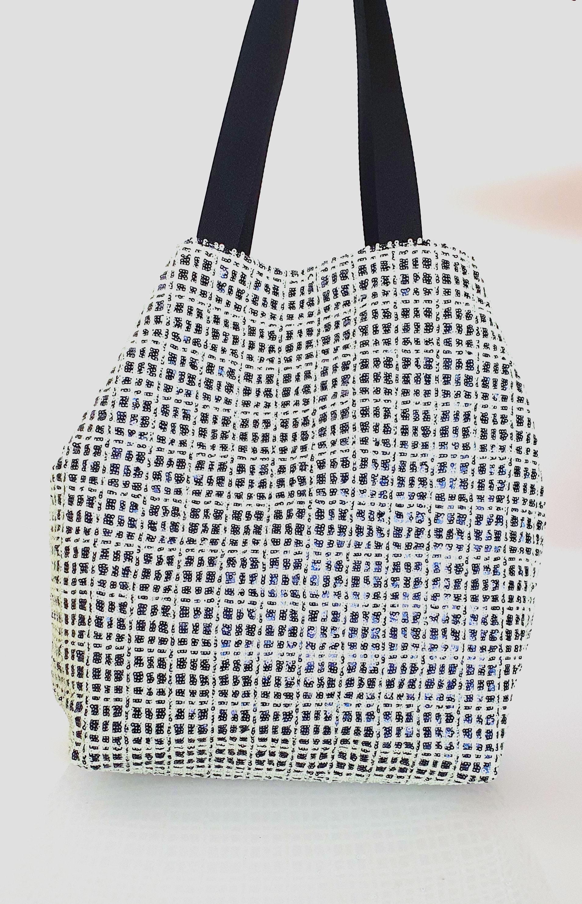 Paillettes03mm_glowy_grid_canapina