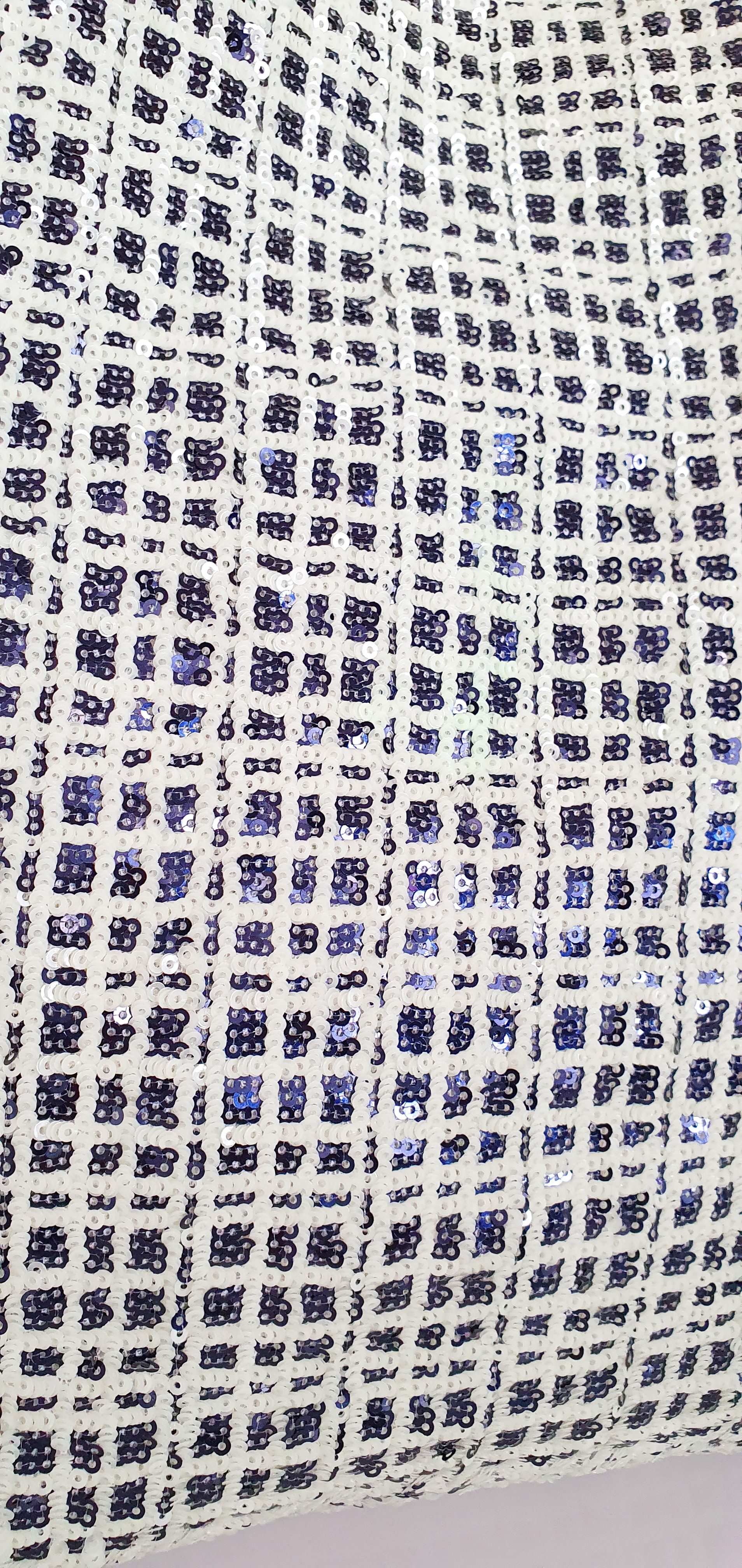 Paillettes03mm_glowy_grid_canapina